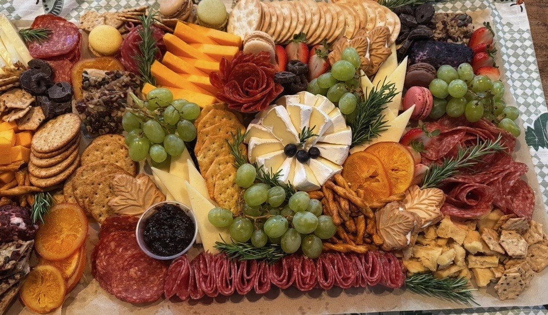 Charcuterie board with brie centerpiece