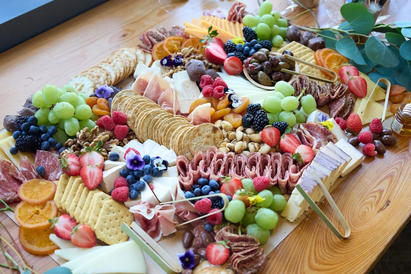 Artisan charcuterie board with fresh fruit and cheese